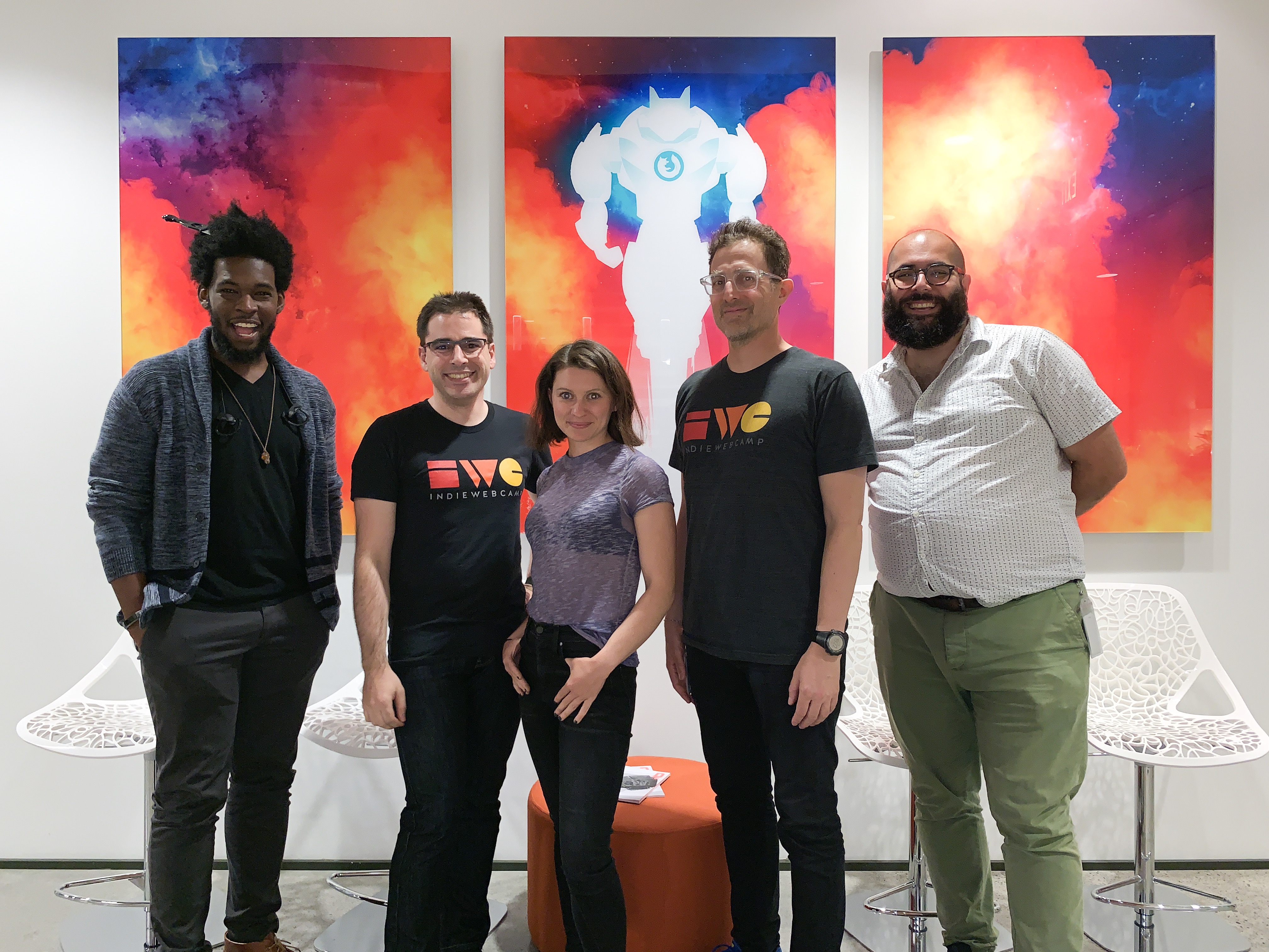 Jacky, Aaron, Hannah, Tantek, and Darius standing infront of Firefox themed art at Mozilla Portland