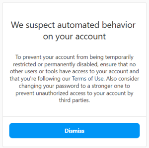 Screenshot of Instagram reading 'We suspect automated behavior on your account. To prevent your account from being temporarily restricted or permanently disabled, ensure that no other users or tools have access to your account and that you're following the Terms of Use. Also consider changing your password to a stronger one to prevent unauthorized access to your account by third parties.